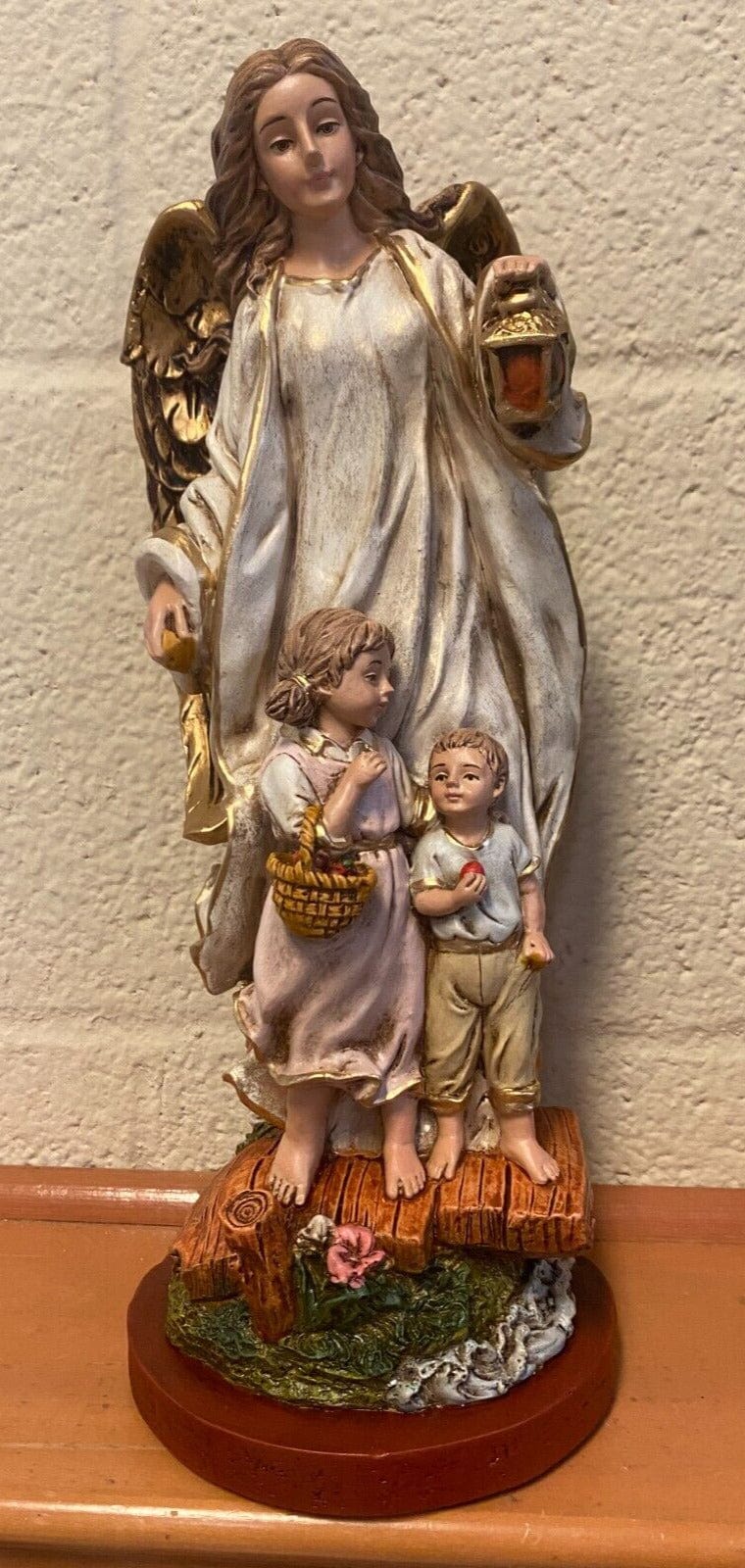 Large hand-painted Guardian Angel statue by Bob and Penny Lord, 13-inch religious figurine for spirituality and collectibles.