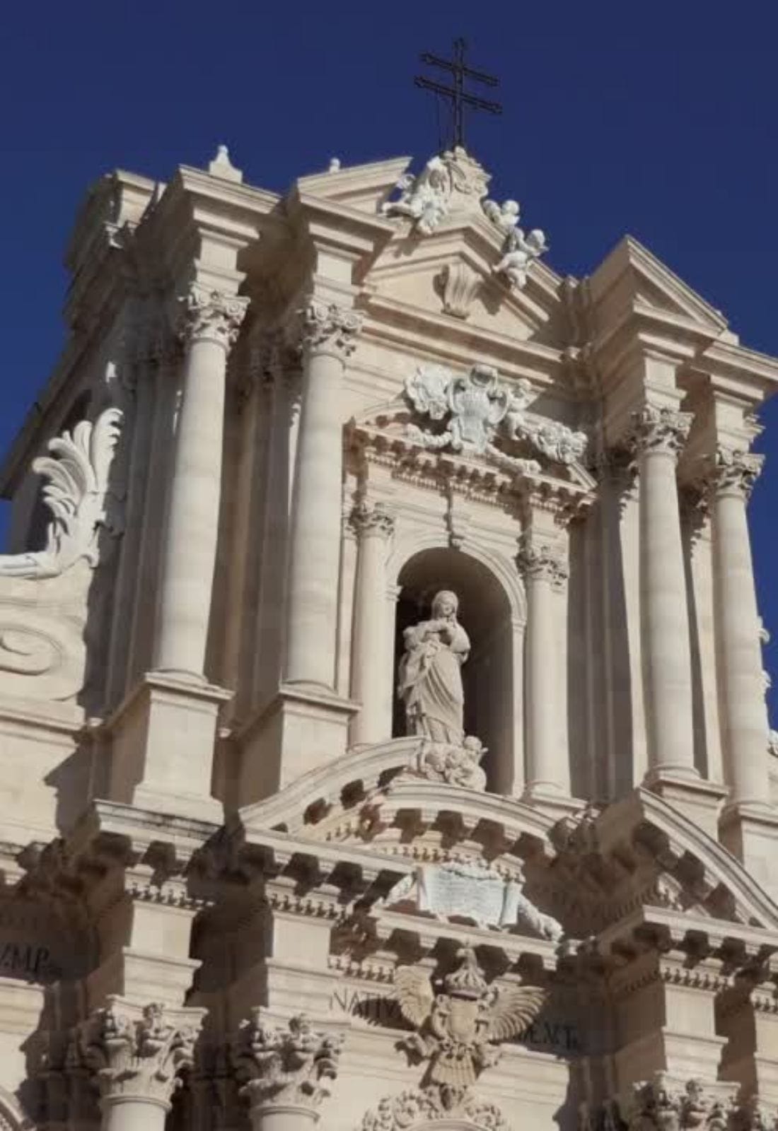 DVD titled Our Lady of Tears Siracusa Sicily by Bob and Penny Lord, featuring a cover image of religious artwork and scenic Sicilian landscape.