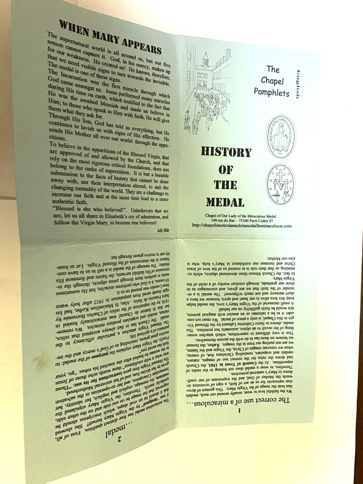 Collectible Lady of the Miraculous Medal folder with history and medal, featuring Christian holy card design by Bob and Penny Lord.
