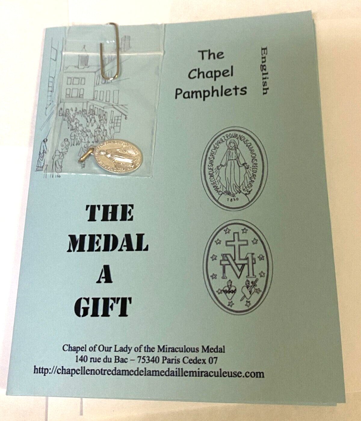 Our Lady of the Miraculous Medal folder featuring religious holy cards and medals, with detailed imagery and spiritual significance.