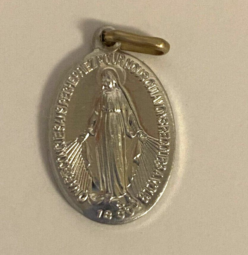 Collectible Our Lady of the Miraculous Medal folder with Holy Card, featuring Christian religious imagery from Bob and Penny Lord.