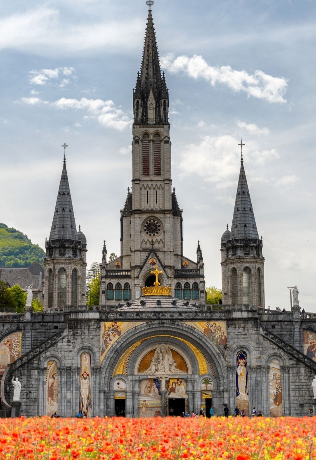 DVD of Our Lady of the Rosary in Lourdes by Bob and Penny Lord, showing the DVD case with religious imagery and Lourdes scenes.