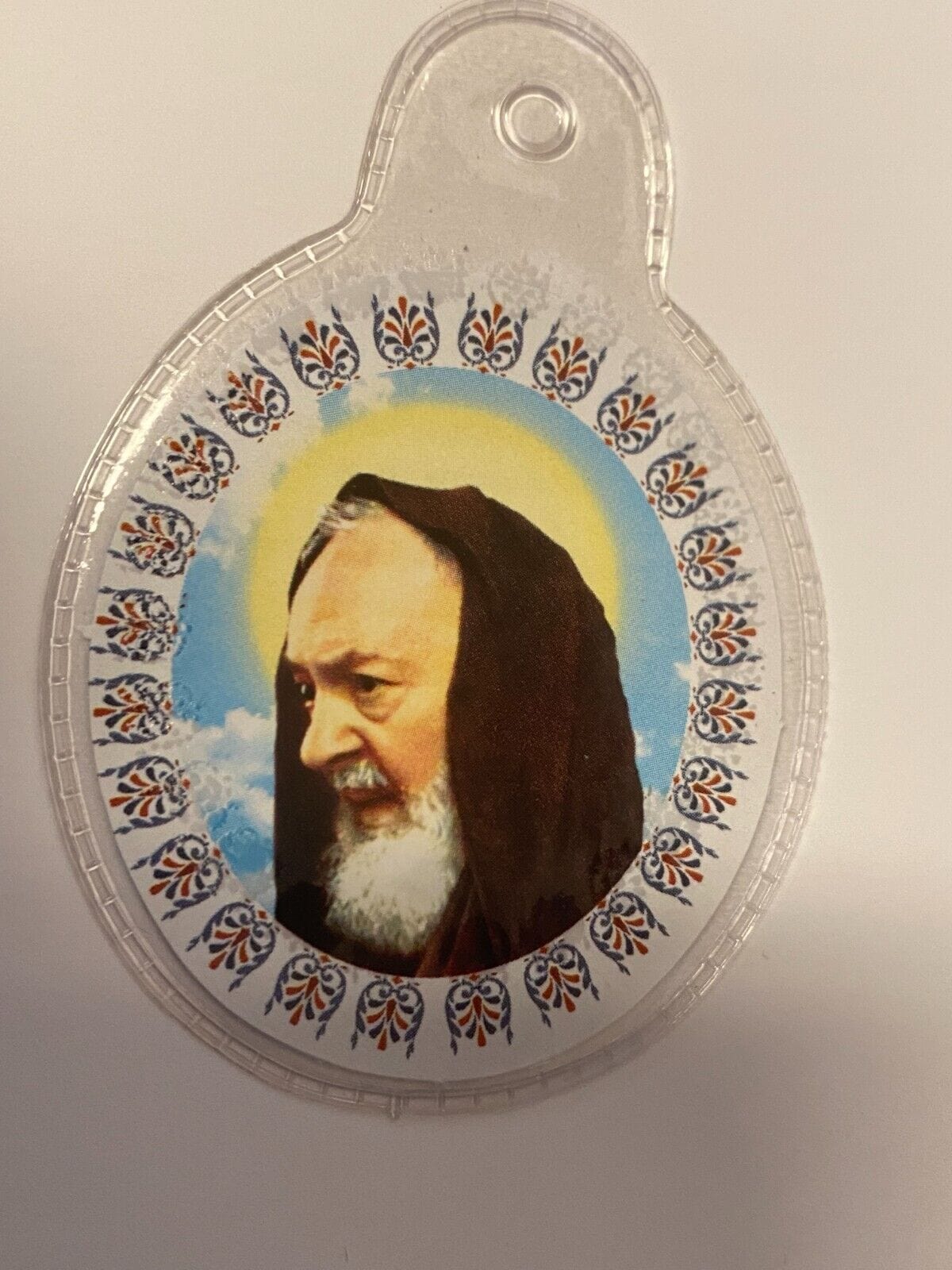 Padre Pio 3rd Class Relic in plastic encase, Christian religious collectible from Italy, by Bob and Penny Lord.