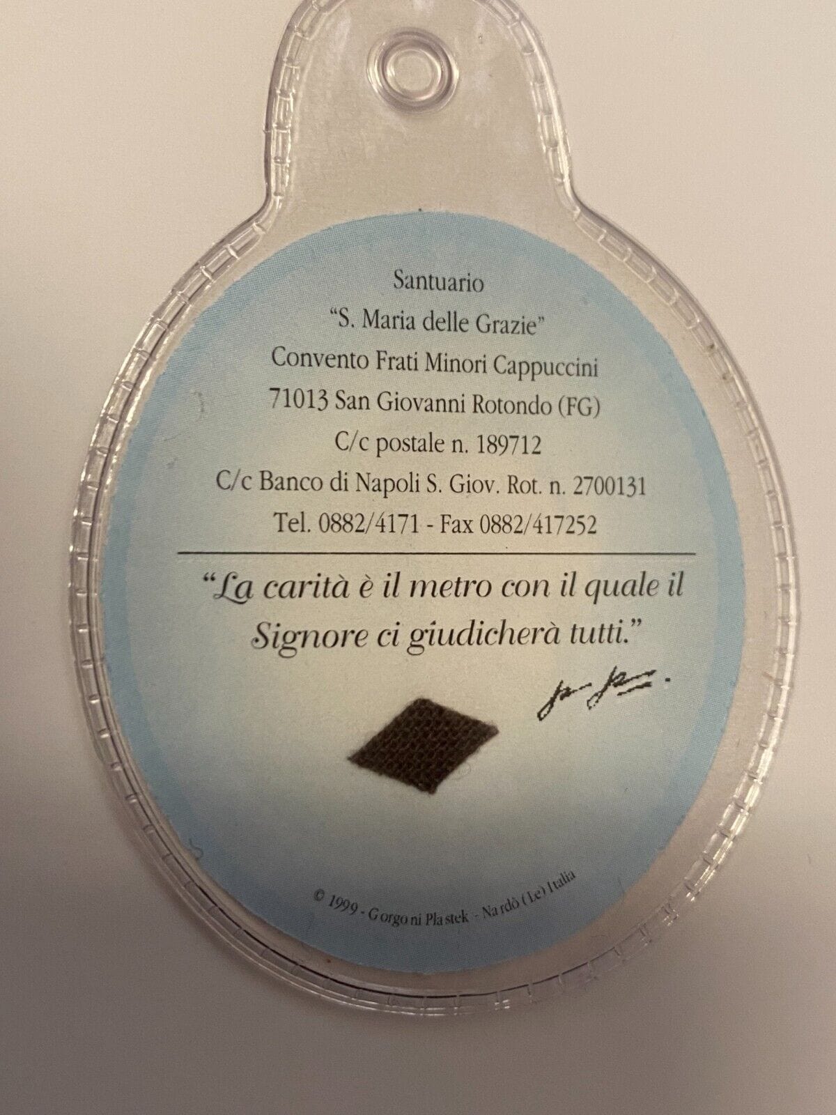 Padre Pio 3rd Class Relic in plastic case, religious Christian collectible from Italy by Bob and Penny Lord.