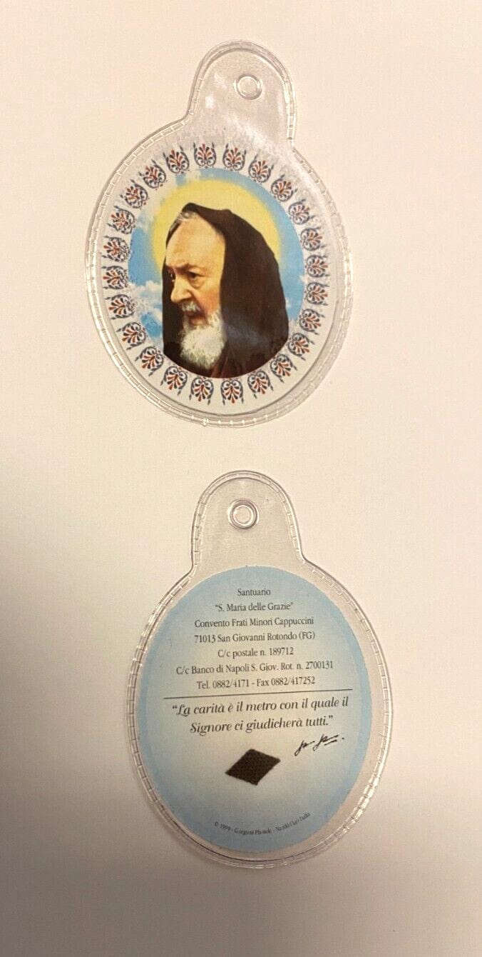 Plastic encased Padre Pio 3rd Class relic, religious Christian relic collectible from Italy, by Bob and Penny Lord.