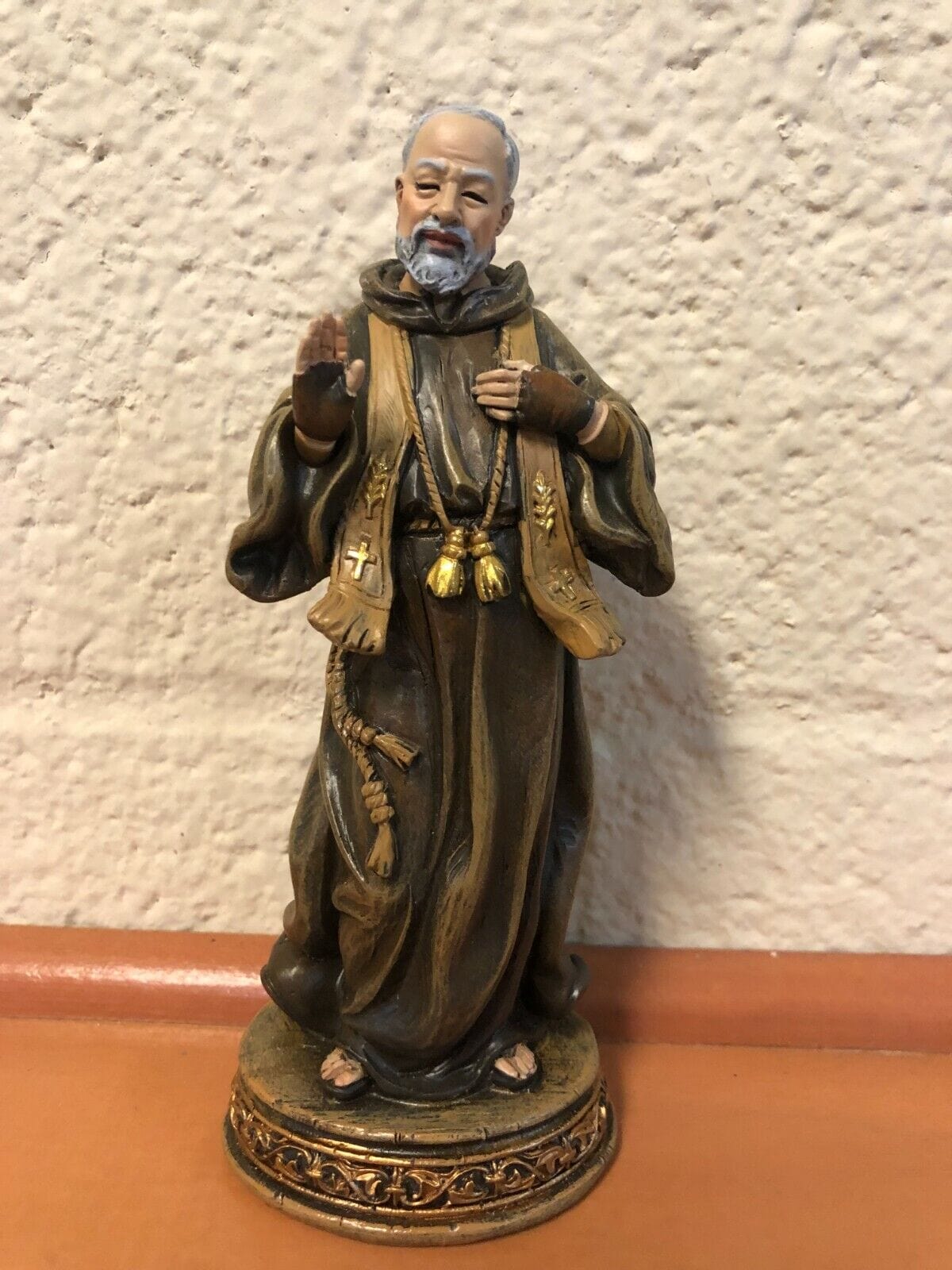Father Pio 6-inch religious statue by Bob and Penny Lord, depicting Saint Padre Pio in detailed ceramic or resin craftsmanship.