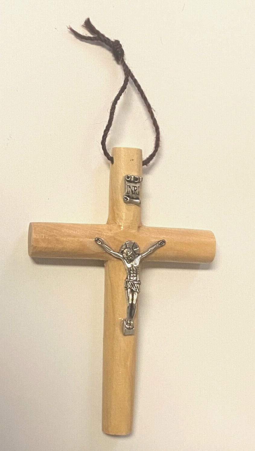 Round olive wood cross from Jerusalem, 4.7/8 inches, handcrafted Christian crucifix, featuring natural wood grain and religious symbolism.