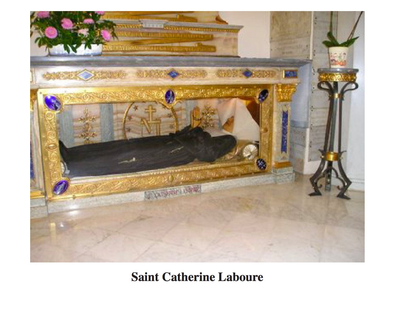 Saint Catherine Laboure and Miraculous Minibook by Bob and Penny Lord Ministry, featuring a small religious booklet with images and text.