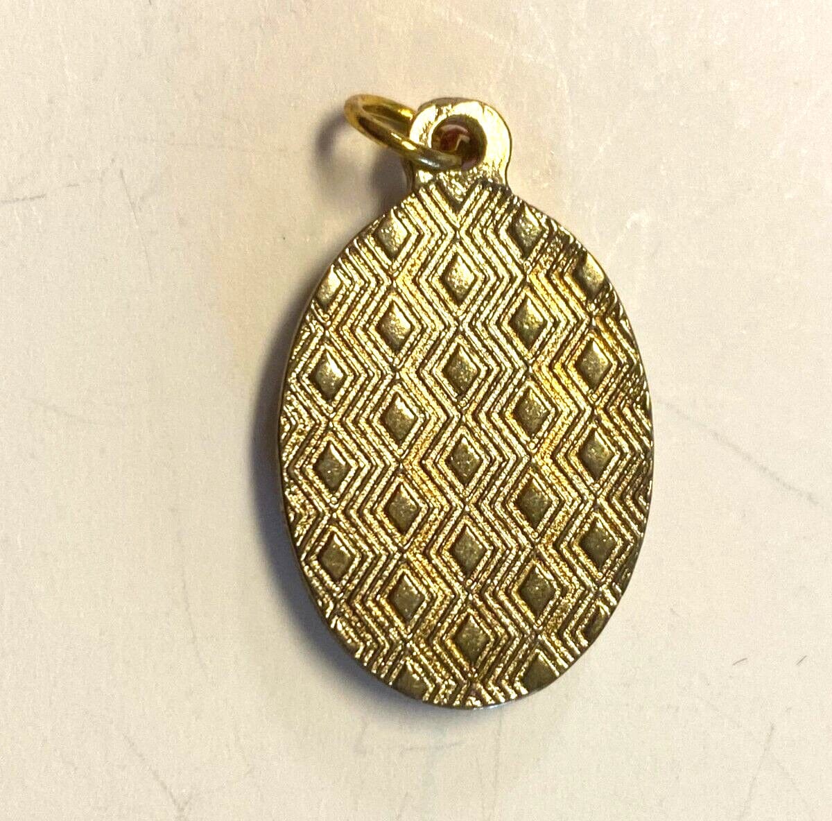Oval Saint Clare of Montefalco medal by Bob and Penny Lord, religious Christian collectible from Italy, featuring saint's image.