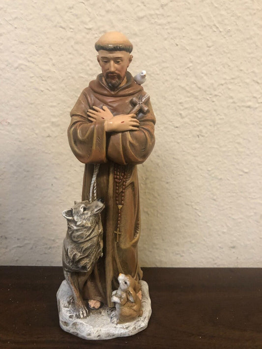 Saint Francis of Assisi 8-inch statue by Bob and Penny Lord, depicting the revered Christian saint in a detailed collectible figure.