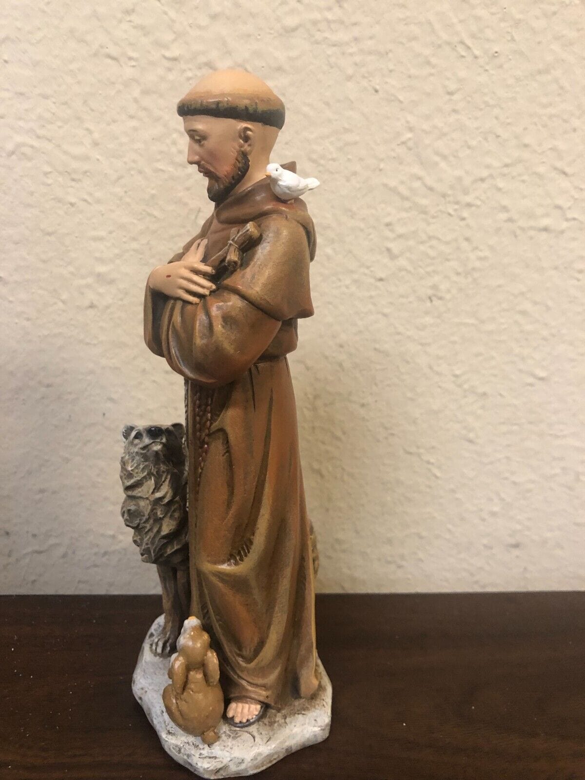 Saint Francis of Assisi 8-inch religious statue by Bob and Penny Lord, depicting Saint Francis with serene expression and detailed craftsmanship.