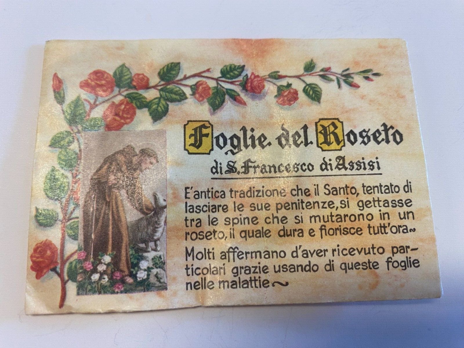 Saint Francis of Assisi leaves from his rose garden collectible by Bob and Penny Lord, featuring detailed religious Christian imagery.
