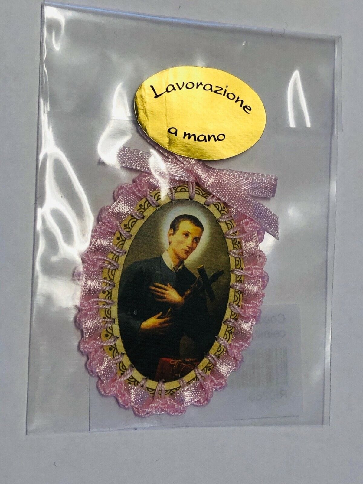 Handmade Saint Gerard Majella Christian collectible with ribbon, crafted in Italy, by Bob and Penny Lord, featuring detailed religious imagery.