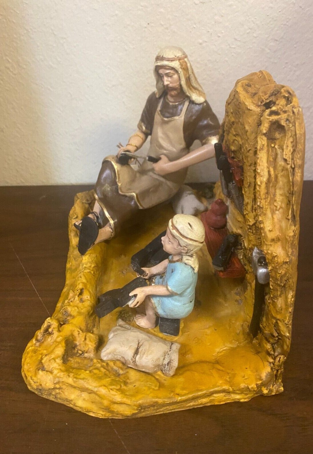Saint Joseph the Worker statue with Child Jesus, religious Christian collectible figure by Bob and Penny Lord, from Colombia.