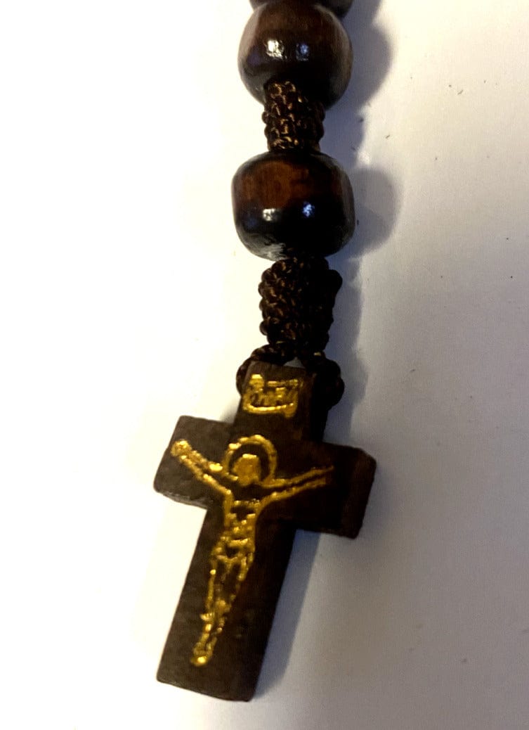 Wood rosary box with Christian rosary inside, featuring Saint Maximilian Kolbe design, from Bob and Penny Lord collection, Colombia.