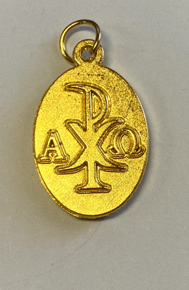 Gold tone Saint Michael the Archangel medal by Bob and Penny Lord, featuring detailed religious imagery on a collectible Christian medal.