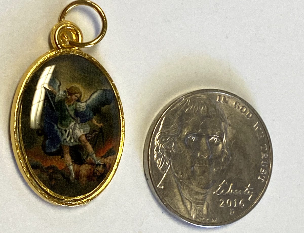 Gold tone Saint Michael the Archangel medal featuring detailed religious design, collectible Christian spirituality medal.
