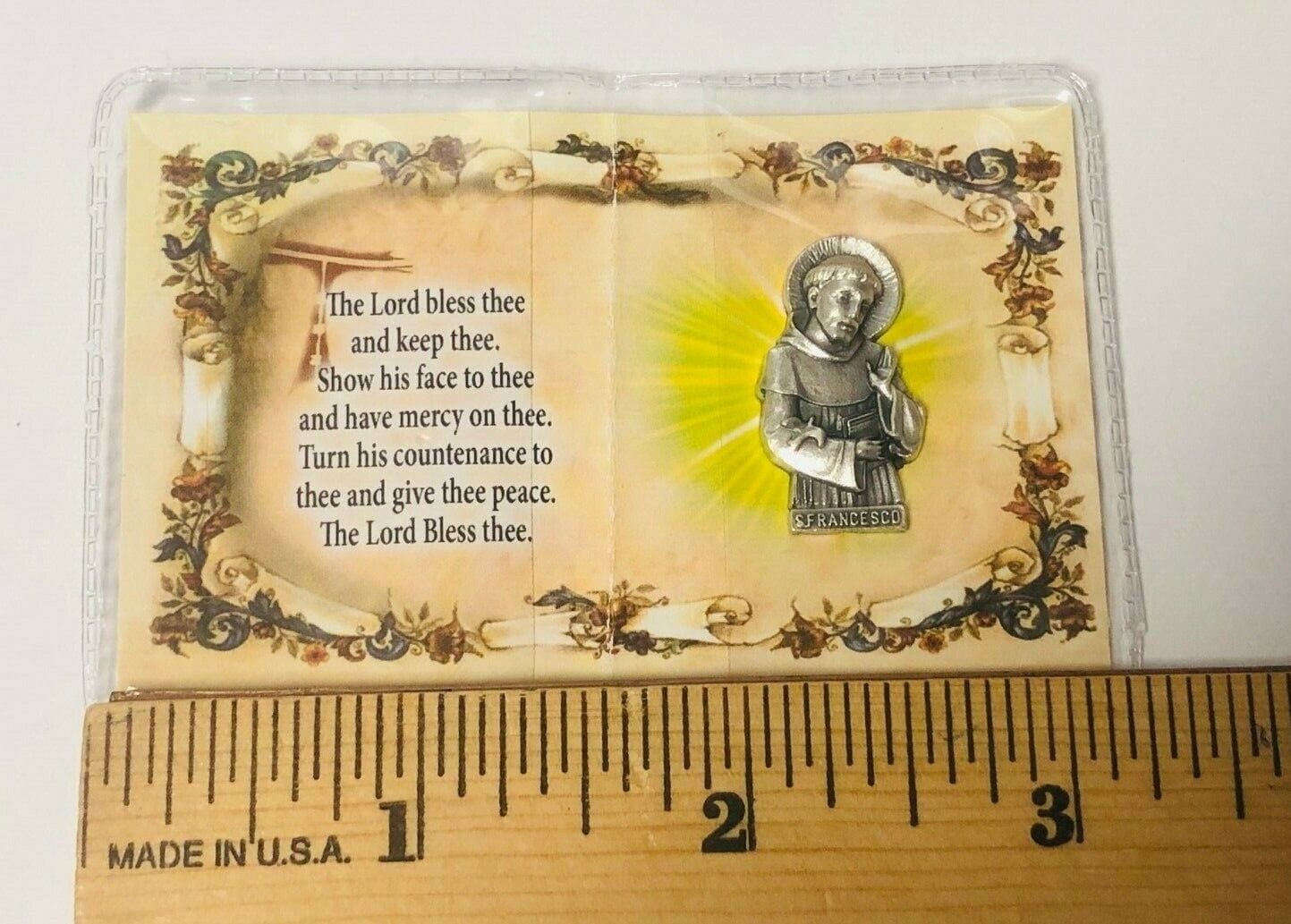 San Francisco de Assisi holy card with prayer and pewter image, part of Christian religious collectibles by Bob and Penny Lord.