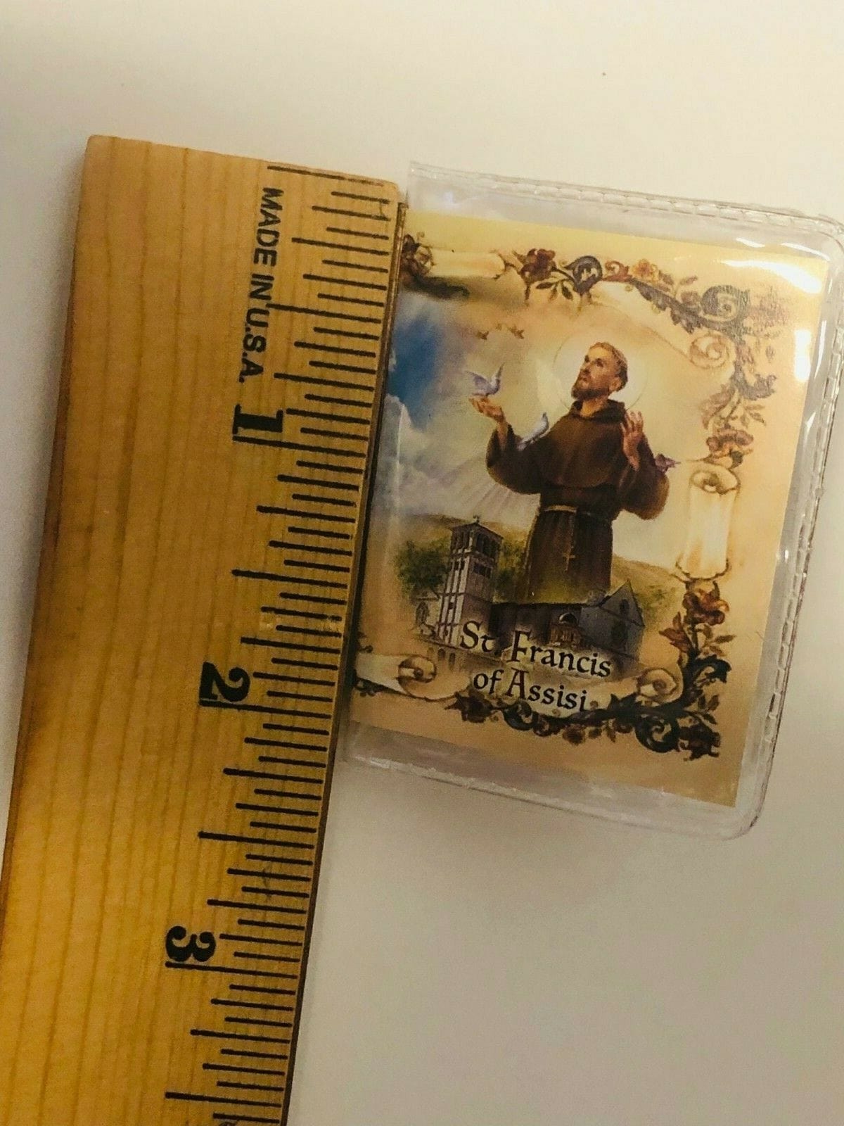 San Francisco de Assisi pewter holy card with prayer and blessing in Spanish, from Bob and Penny Lord collectibles.