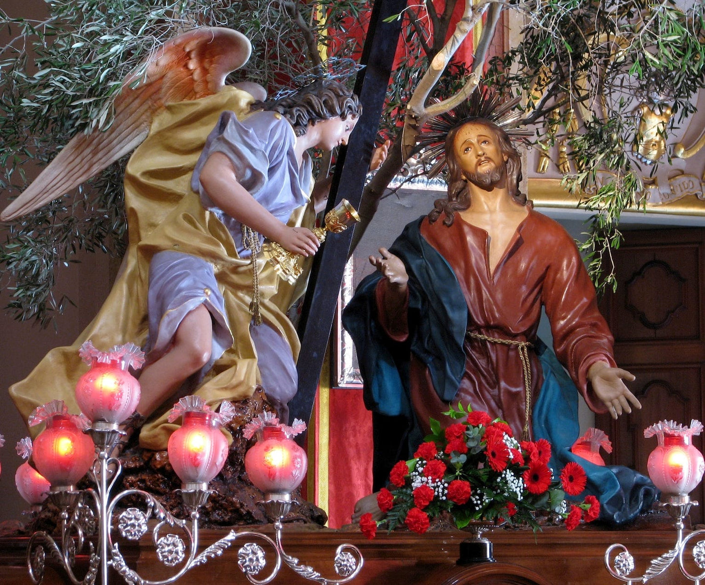 Book titled "The Rosary: The Life of Jesus and Mary" by Bob and Penny Lord, showing the cover with religious imagery.